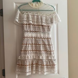 White dress, perfect for a bridal shower or rehearsal dinner!